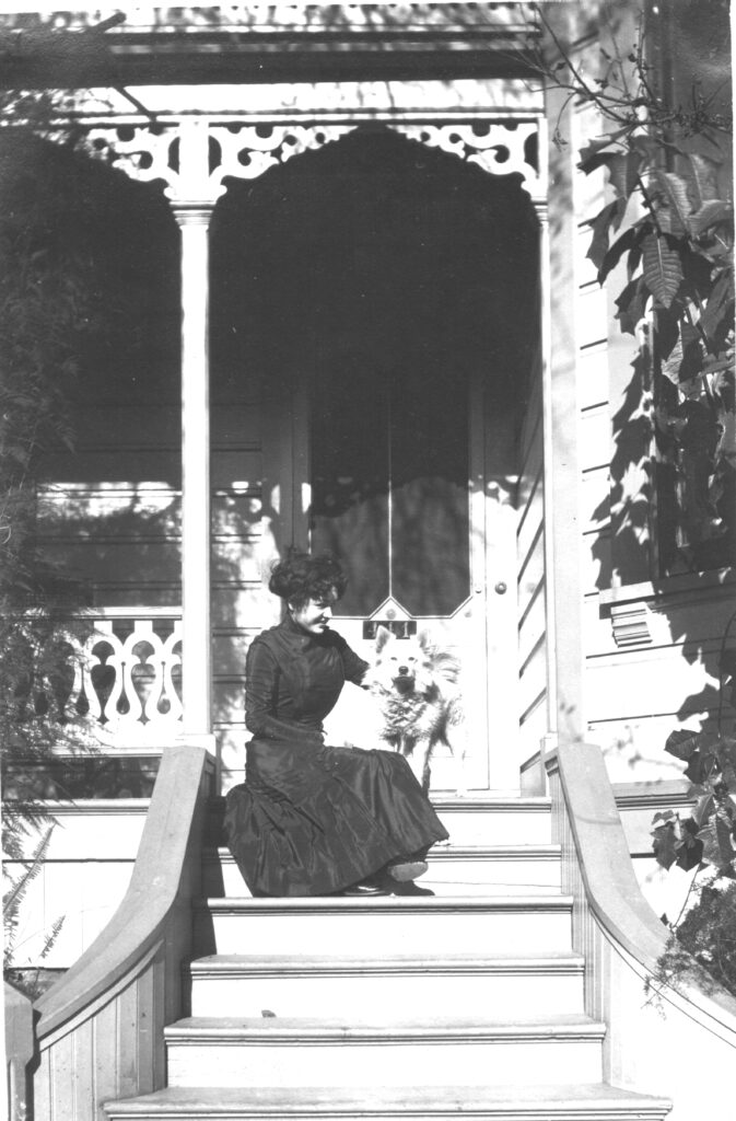 Louise sitting with dog